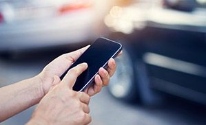 A person using their cell phone. 