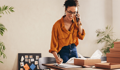 Woman on the phone in her office.