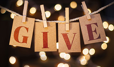 A sign that says - GIVE. 