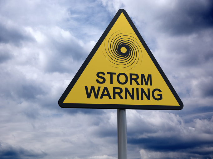 A street sign for storm warning.
