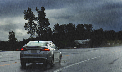 car on the road . 