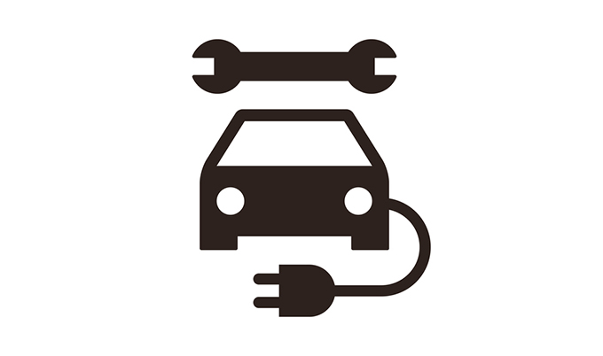 An illustration a wrench above a car and plug connect to the car.