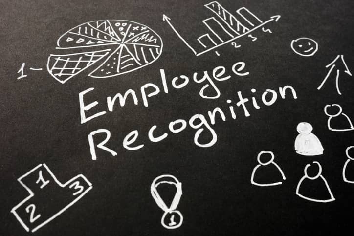 Blackboard with employee recognition written on it.