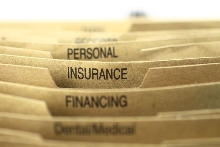 A view of filing folders for: personal, insurance, and finance paperwork.