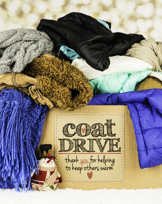 A couch drive box full of coats.