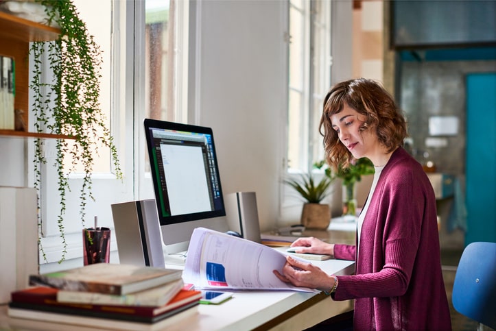 Woman working on her computer.