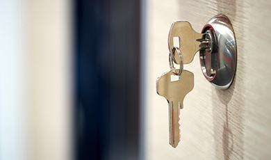 Keys in a door. 