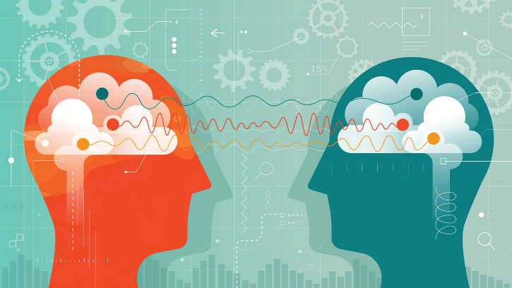 Animated illustration of two brains exchange wave signal with each other.