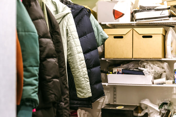 A view of unorganized closet.