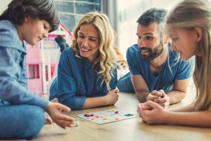 A family playing a board game.