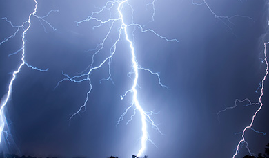 Lightning strikes in the sky. 