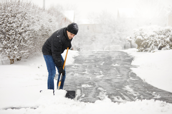 Person shoveling snow.