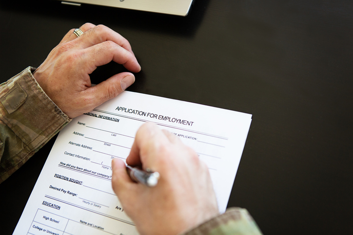 A veteran filling out an employment application.