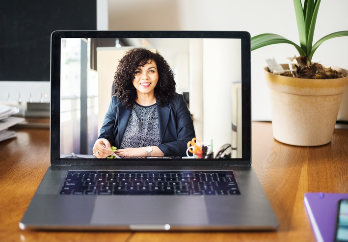A woman recruiter on video-conference screen.