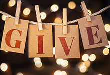A sign that says - GIVE.